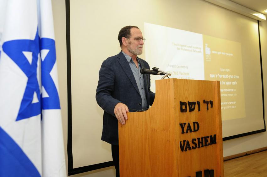 Dr. Avihu Ronen presenting a lecture on his book about the way in which  the Shoah was perceived in Israel's first few decades
